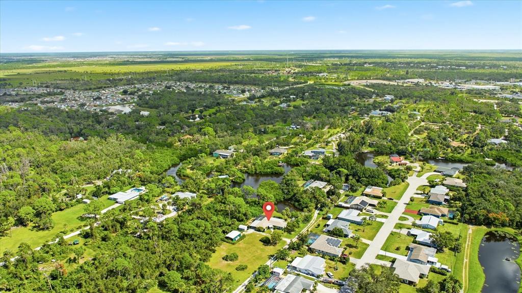 229 Stratford Road Englewood, FL 34223 - Photo 48 of 49 a view of an outdoor space and a lake view