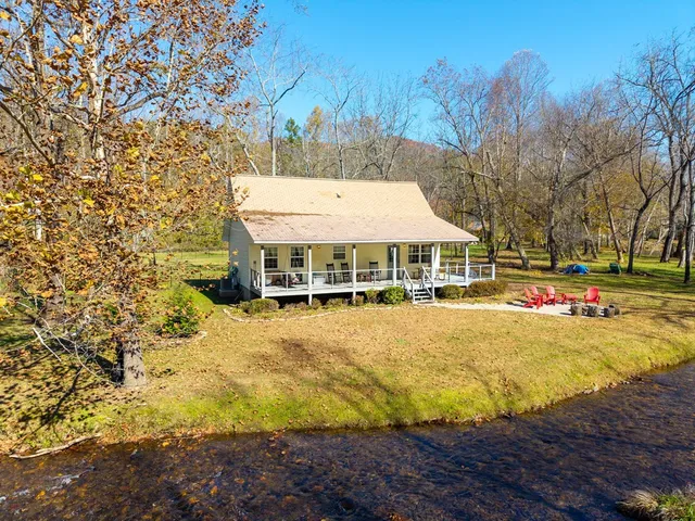 a front view of a house with swimming pool