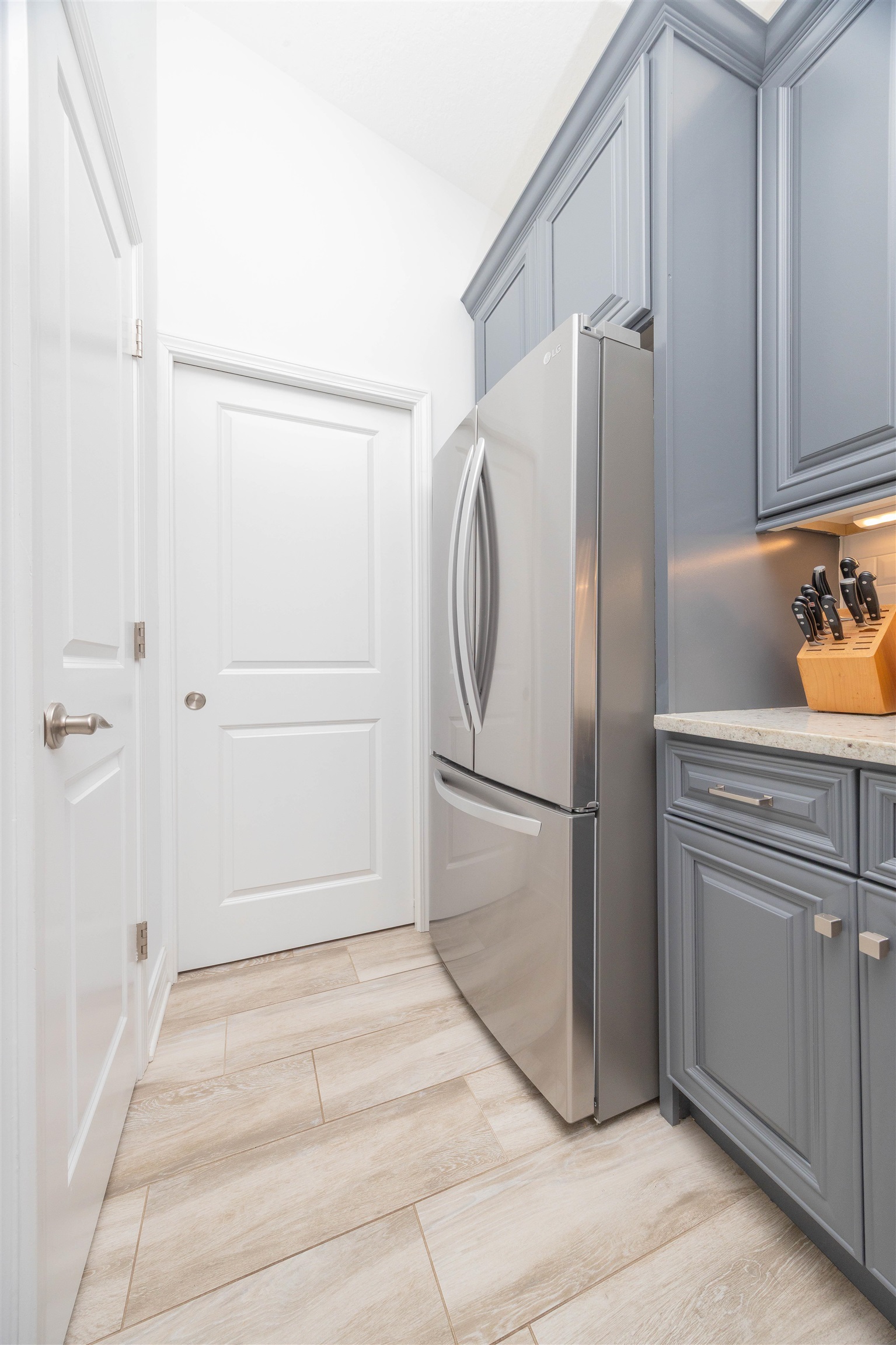 301 Graciela Circle St. Augustine, FL 32086 - Photo 23 of 84 a bathroom with a sink and a refrigerator