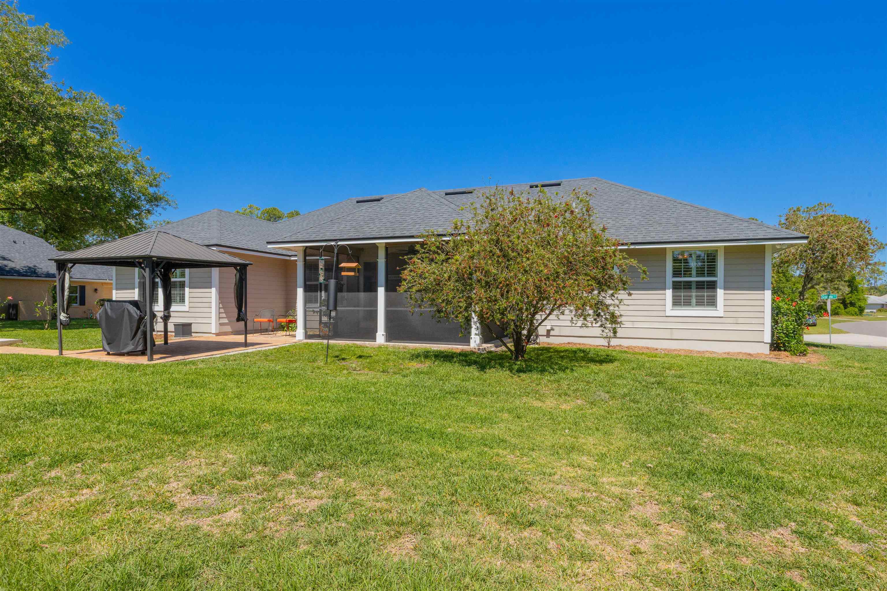 301 Graciela Circle St. Augustine, FL 32086 - Photo 31 of 84 a front view of a house with a garden
