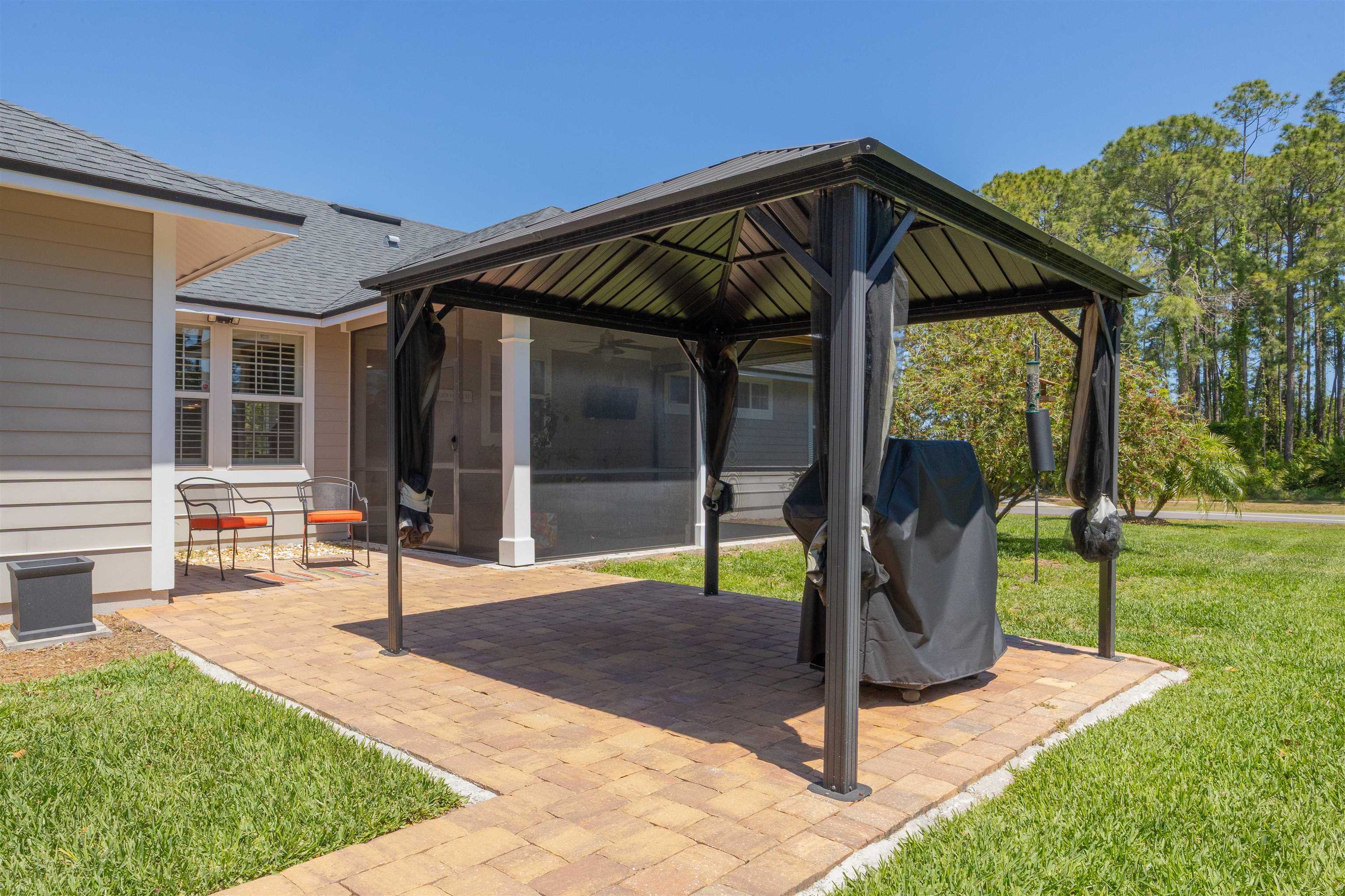 301 Graciela Circle St. Augustine, FL 32086 - Photo 39 of 84 a front view of a house with garden