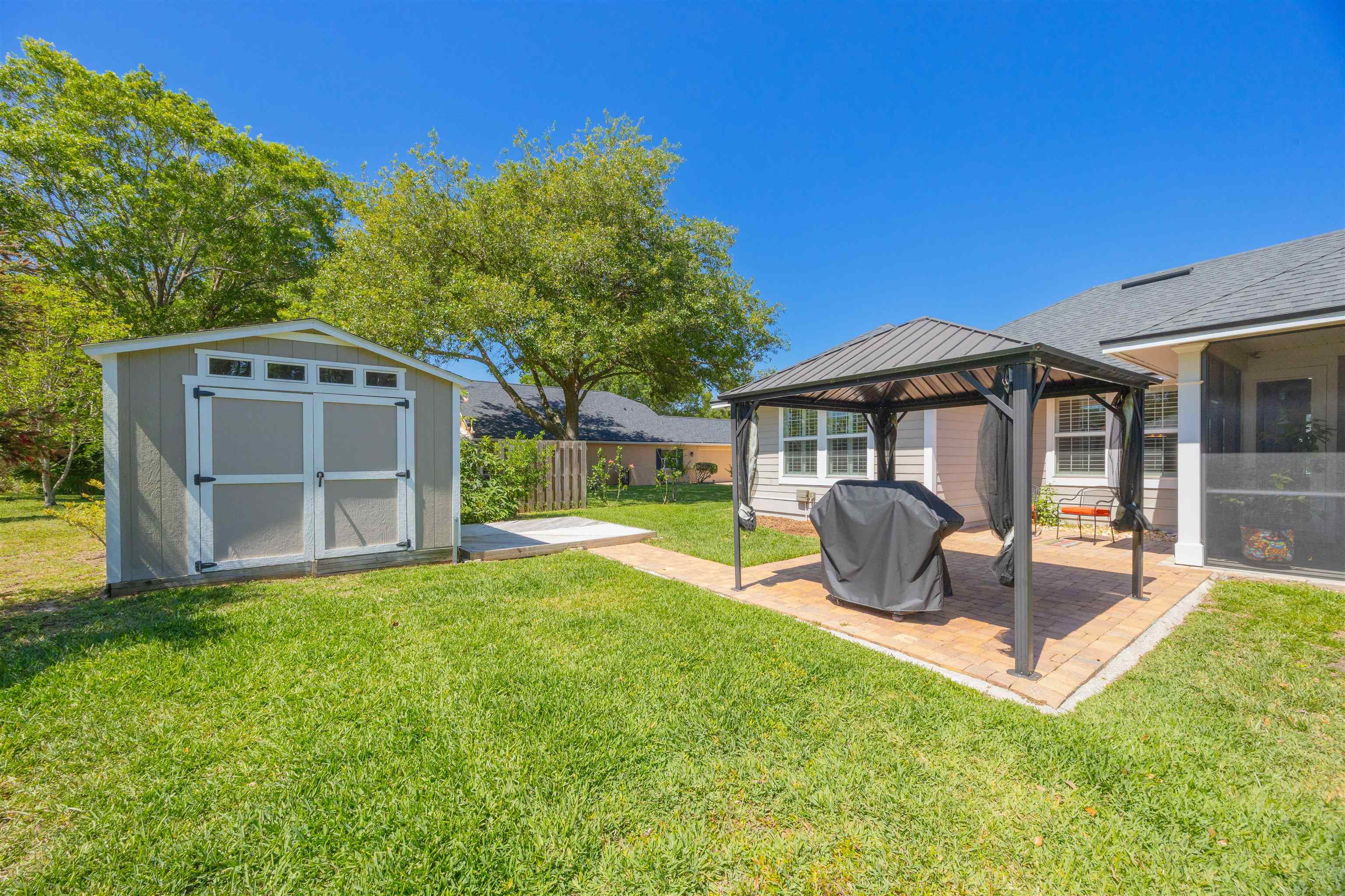 301 Graciela Circle St. Augustine, FL 32086 - Photo 41 of 84 a view of a house with a yard and sitting area