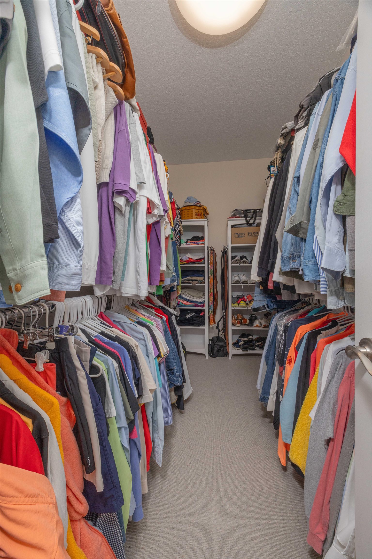 301 Graciela Circle St. Augustine, FL 32086 - Photo 50 of 84 a view of walk in closet with clothes and shoes