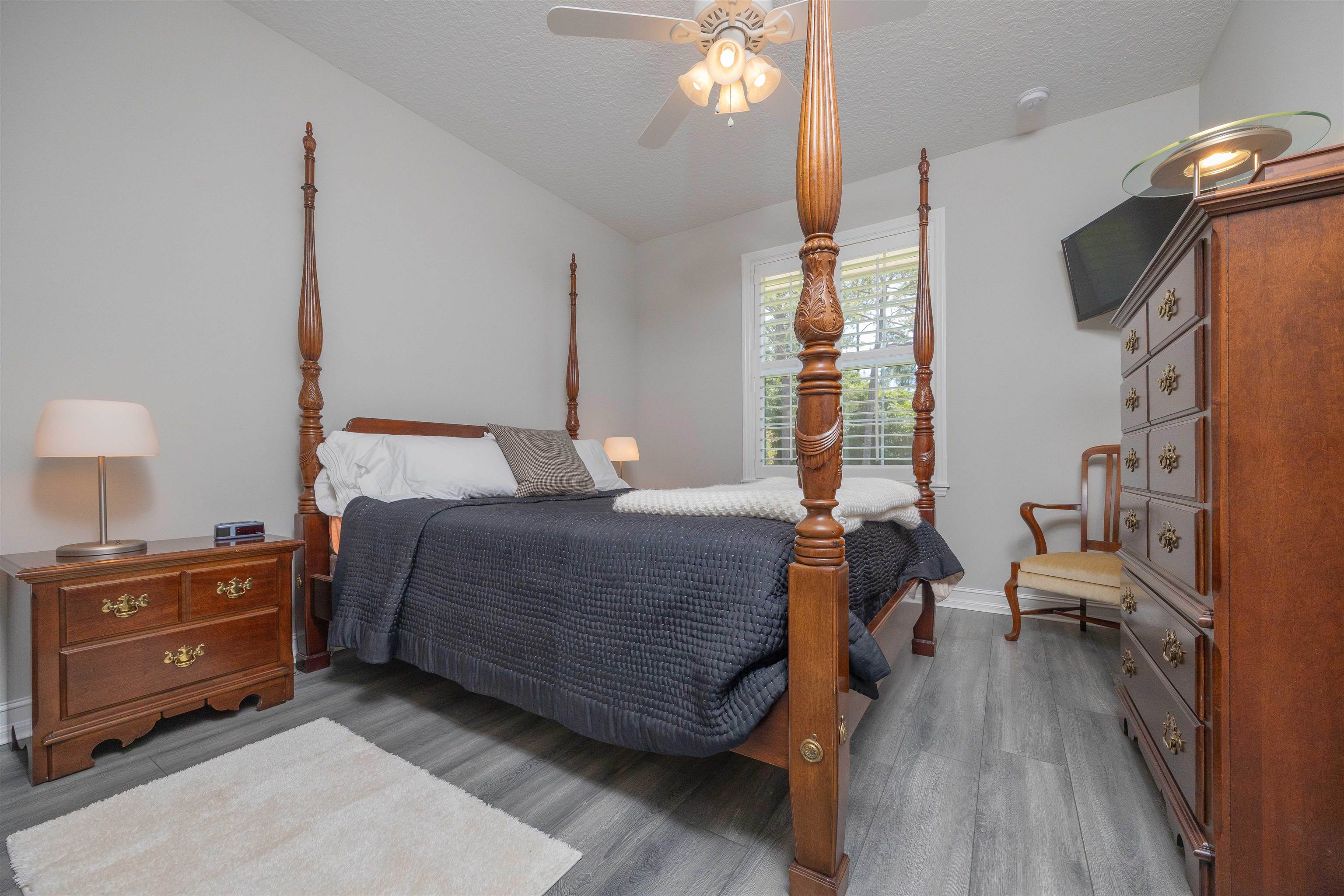 301 Graciela Circle St. Augustine, FL 32086 - Photo 52 of 84 a bedroom with a bed and wooden floor