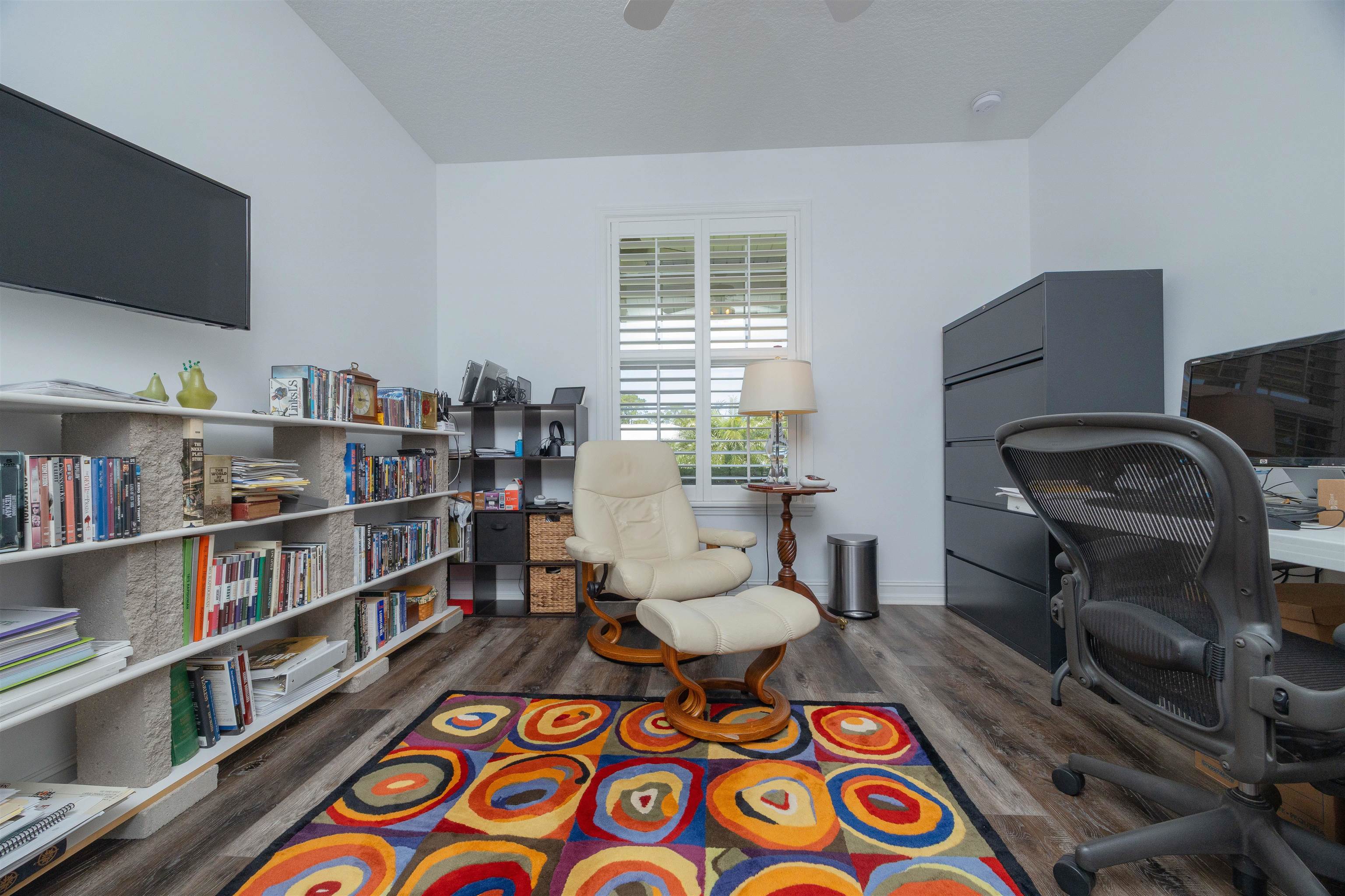 301 Graciela Circle St. Augustine, FL 32086 - Photo 59 of 84 a living room with furniture and a book shelf