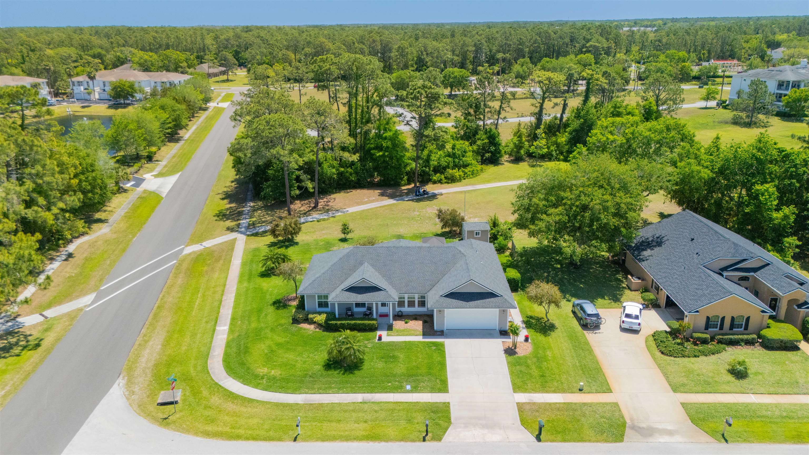 301 Graciela Circle St. Augustine, FL 32086 - Photo 61 of 84 an aerial view of a house with a garden and swimming pool