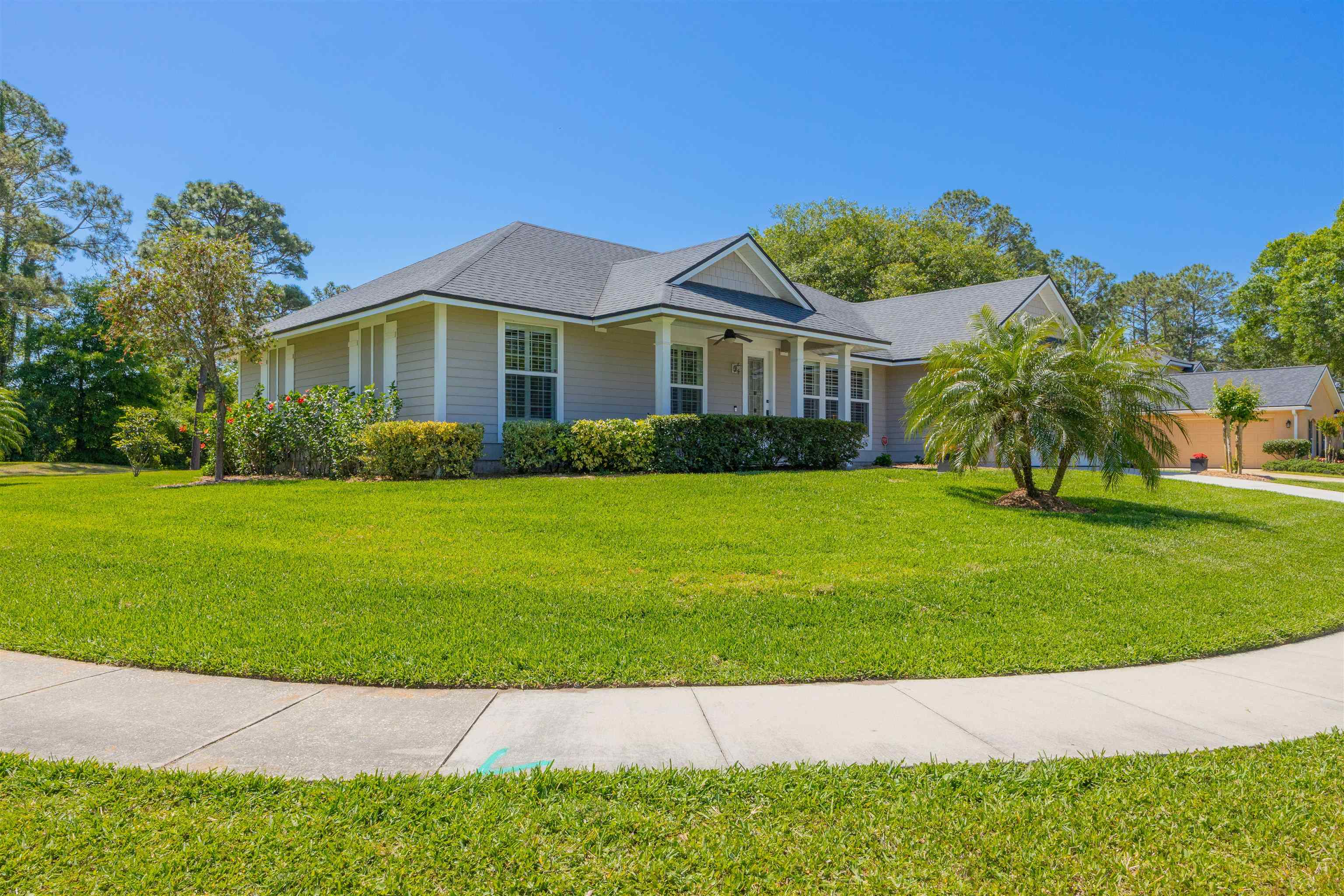 301 Graciela Circle St. Augustine, FL 32086 - Photo 7 of 84 a front view of a house with a garden