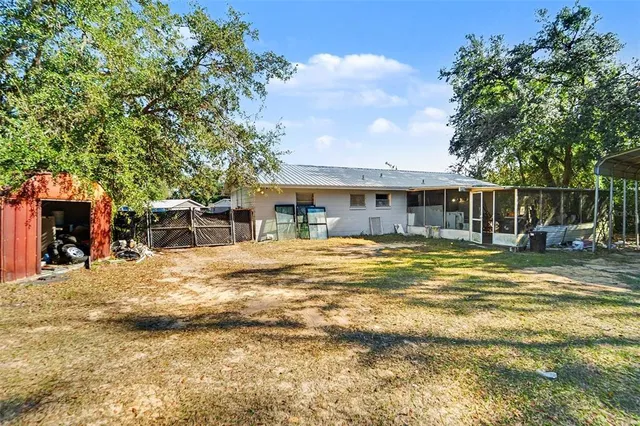 a view of a house with a swimming pool