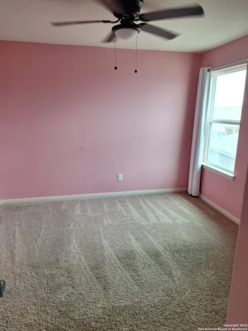 en empty room with windows