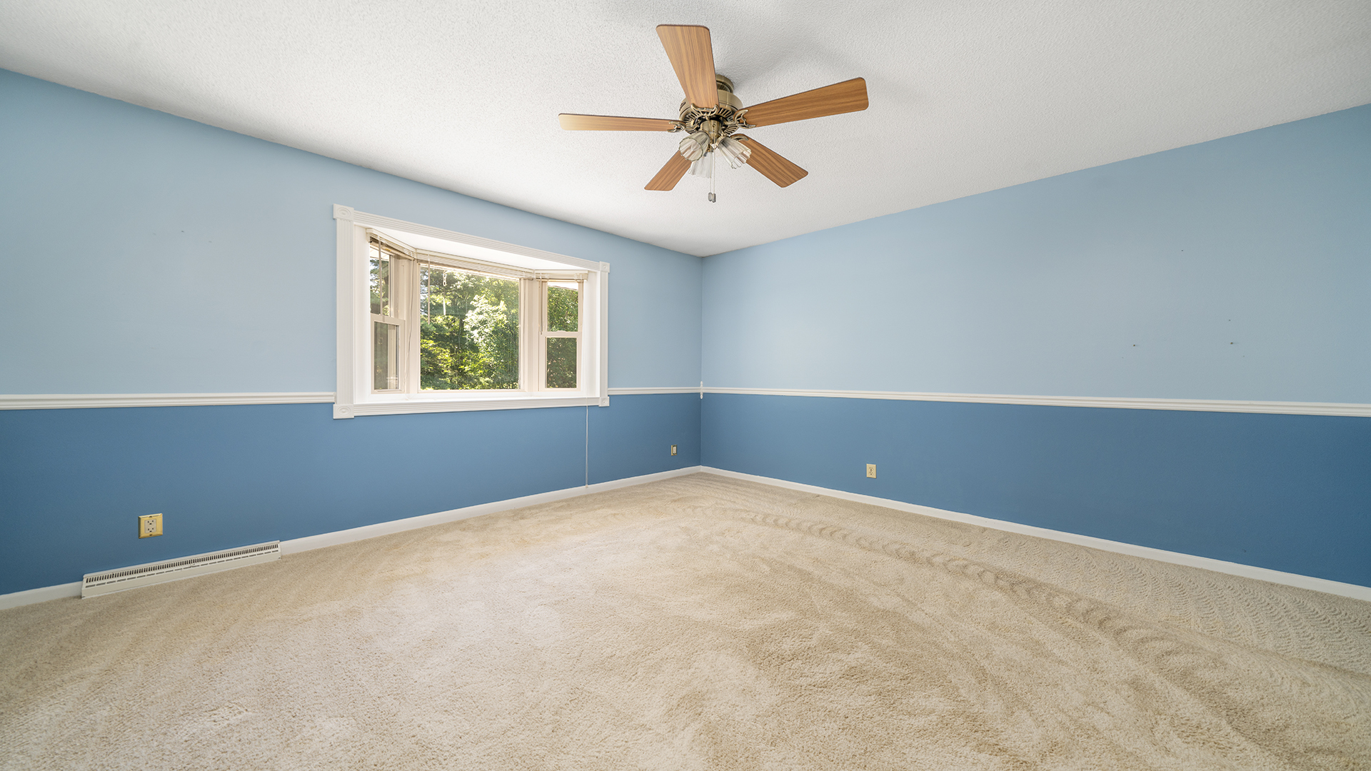 861 Riverside Drive Dixon, IL 61021 - Photo 11 of 33 an empty room with windows and fan