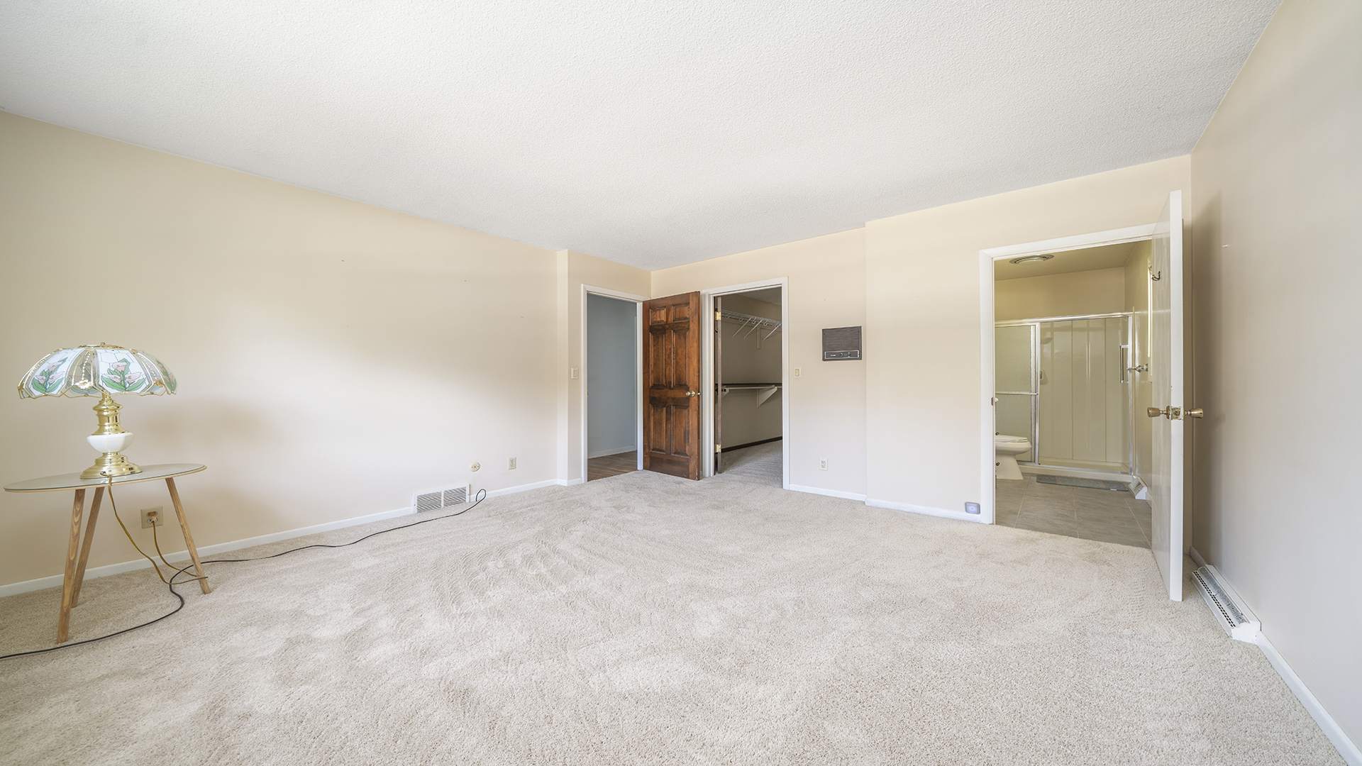861 Riverside Drive Dixon, IL 61021 - Photo 16 of 33 a view of an empty room with a chandelier