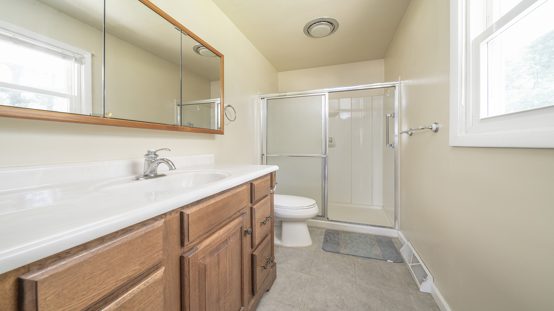 861 Riverside Drive Dixon, IL 61021 - Photo 17 of 33 a bathroom with a sink a toilet and shower