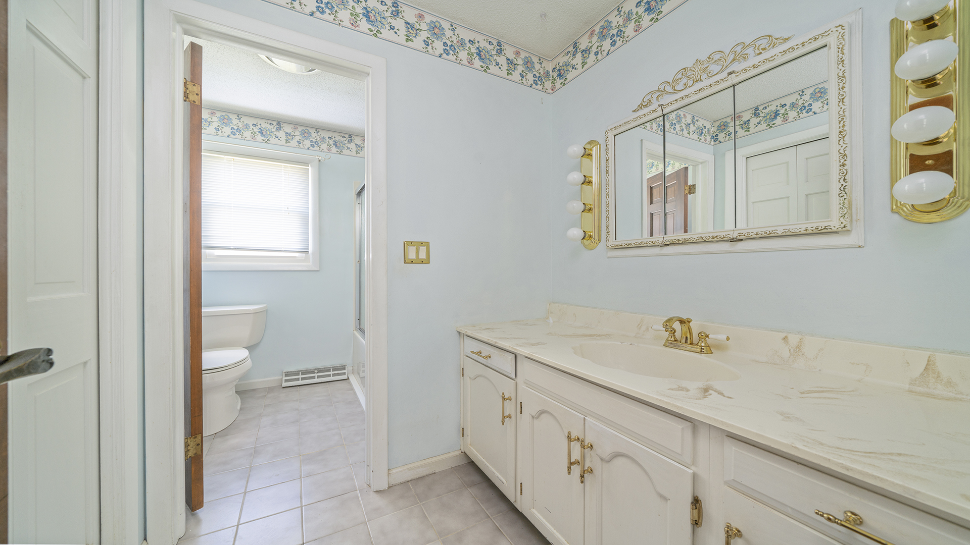 861 Riverside Drive Dixon, IL 61021 - Photo 18 of 33 a spacious bathroom with a sink and a toilet