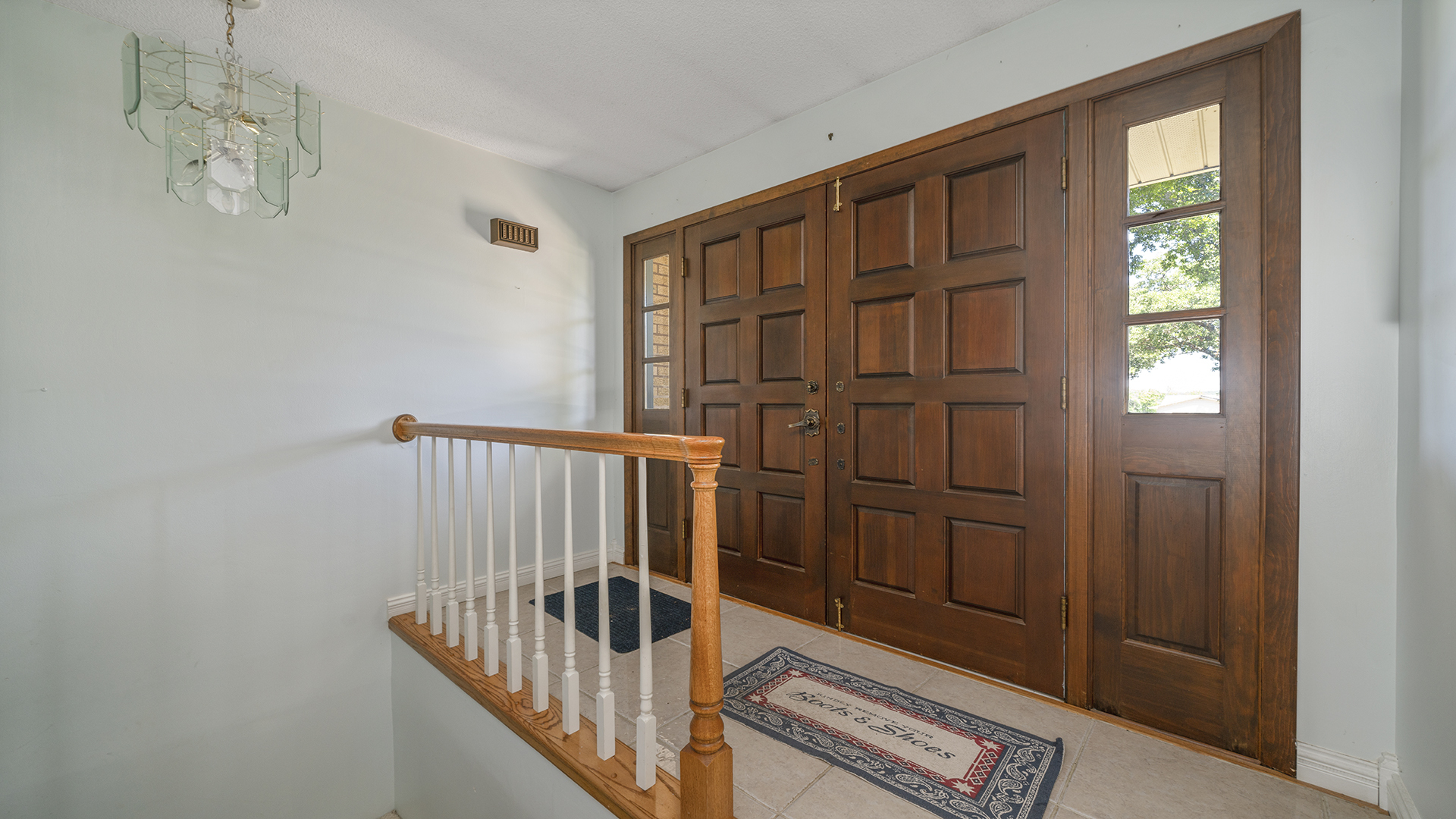 861 Riverside Drive Dixon, IL 61021 - Photo 3 of 33 a view of staircase with white walls and a window