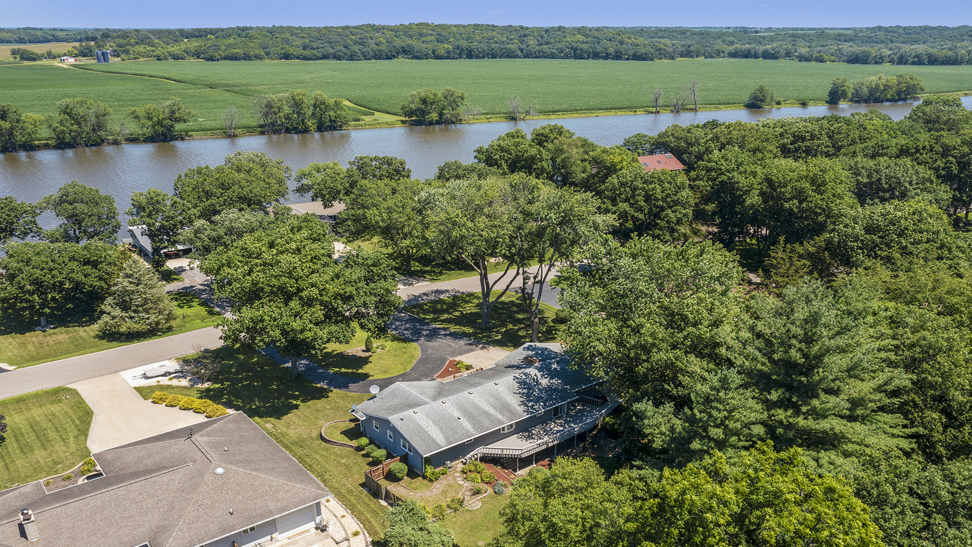 861 Riverside Drive Dixon, IL 61021 - Photo 32 of 33 an aerial view of a house with a yard and lake view