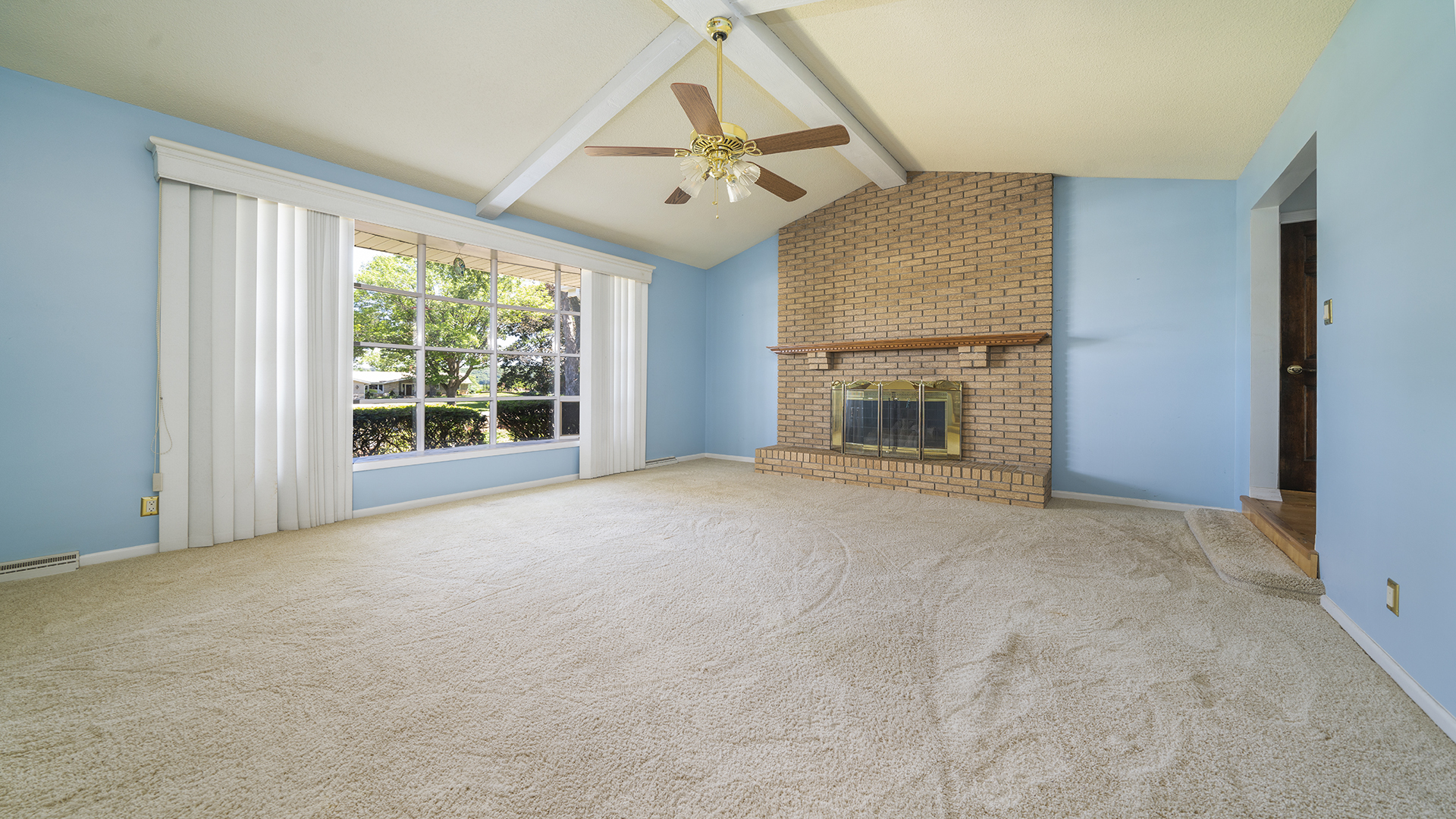 861 Riverside Drive Dixon, IL 61021 - Photo 4 of 33 a view of livingroom with fireplace hardwood floor and ceiling fan