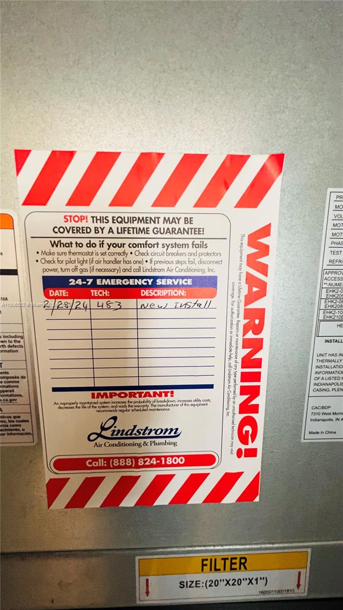 6732 West Sample Road, Unit 6732 Coral Springs, FL 33067 - Photo 25 of 25 a room with red and white walls