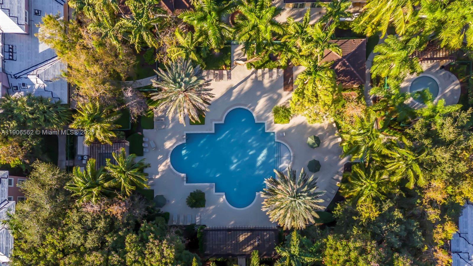 6732 West Sample Road, Unit 6732 Coral Springs, FL 33067 - Photo 4 of 25 a view of a house with a tree