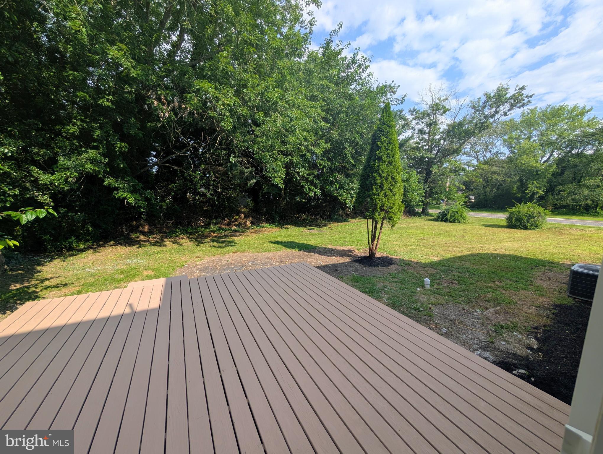 1037 Queens Road Vineland, NJ 08361 - Photo 15 of 40 a view of outdoor space with deck and yard