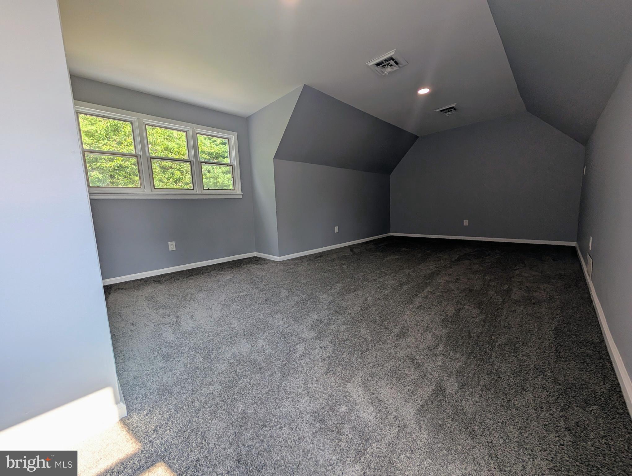 1037 Queens Road Vineland, NJ 08361 - Photo 36 of 40 an empty room with windows