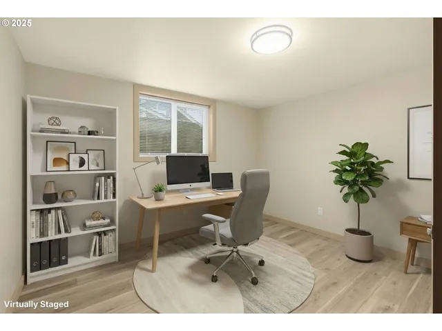 a view of a workspace with furniture