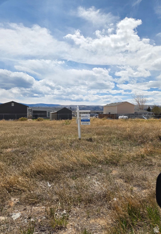 1448 Manila Way, Unit 3 Manila, UT 84046 - Photo 3 of 6 Exterior view of a mountainous background
