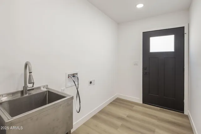 a bathroom with a sink and mirror