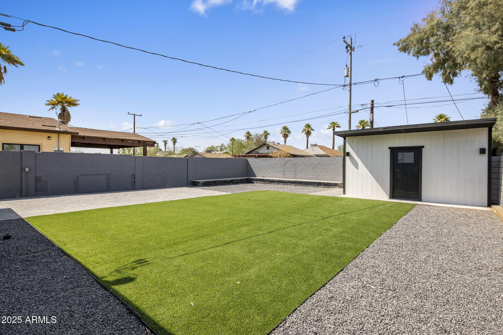 1440 East Pierce Street Phoenix, AZ 85006 - Photo 19 of 20 a view of a backyard with a small pool