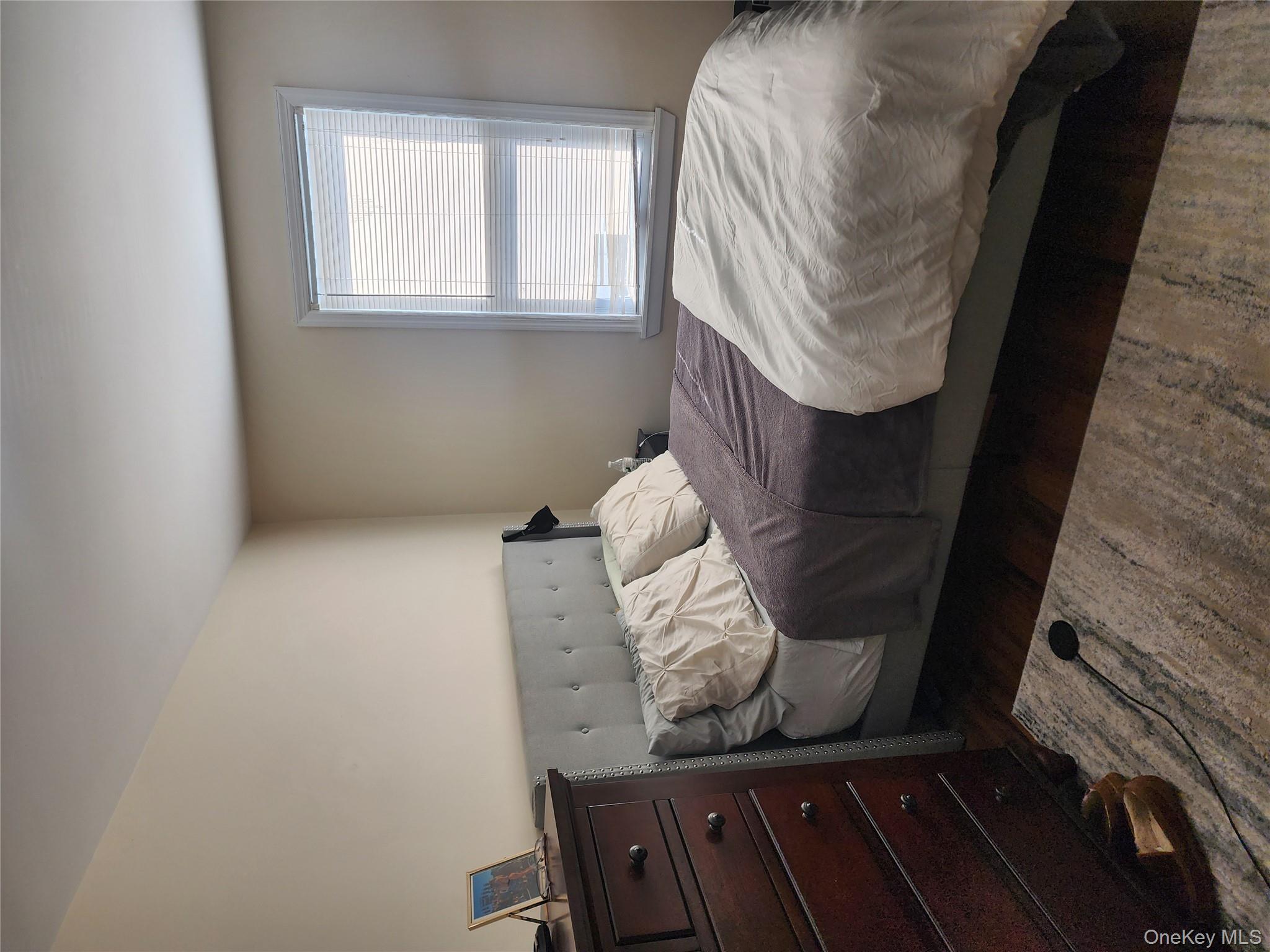 632 Piermont Avenue, Unit 2 Piermont, NY 10968 - Photo 11 of 31 a bedroom with a bed and a window