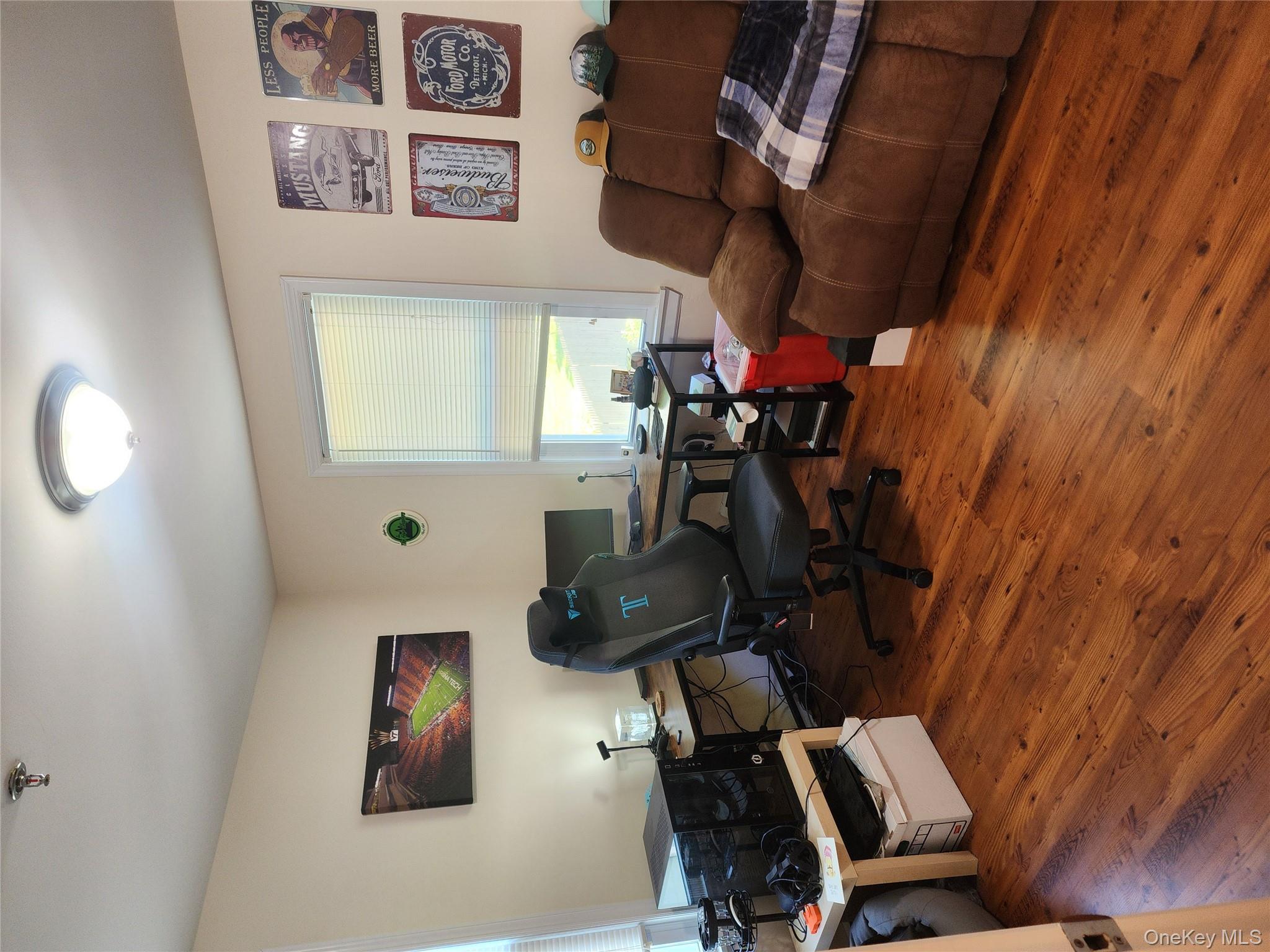 632 Piermont Avenue, Unit 2 Piermont, NY 10968 - Photo 12 of 31 a living room with furniture a flat screen tv and a window