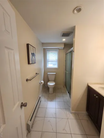 a bathroom with a toilet