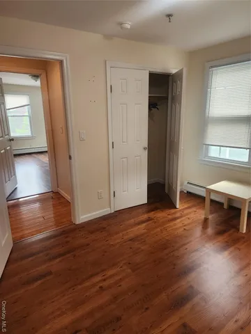 a view of livingroom with furniture wooden floor and window