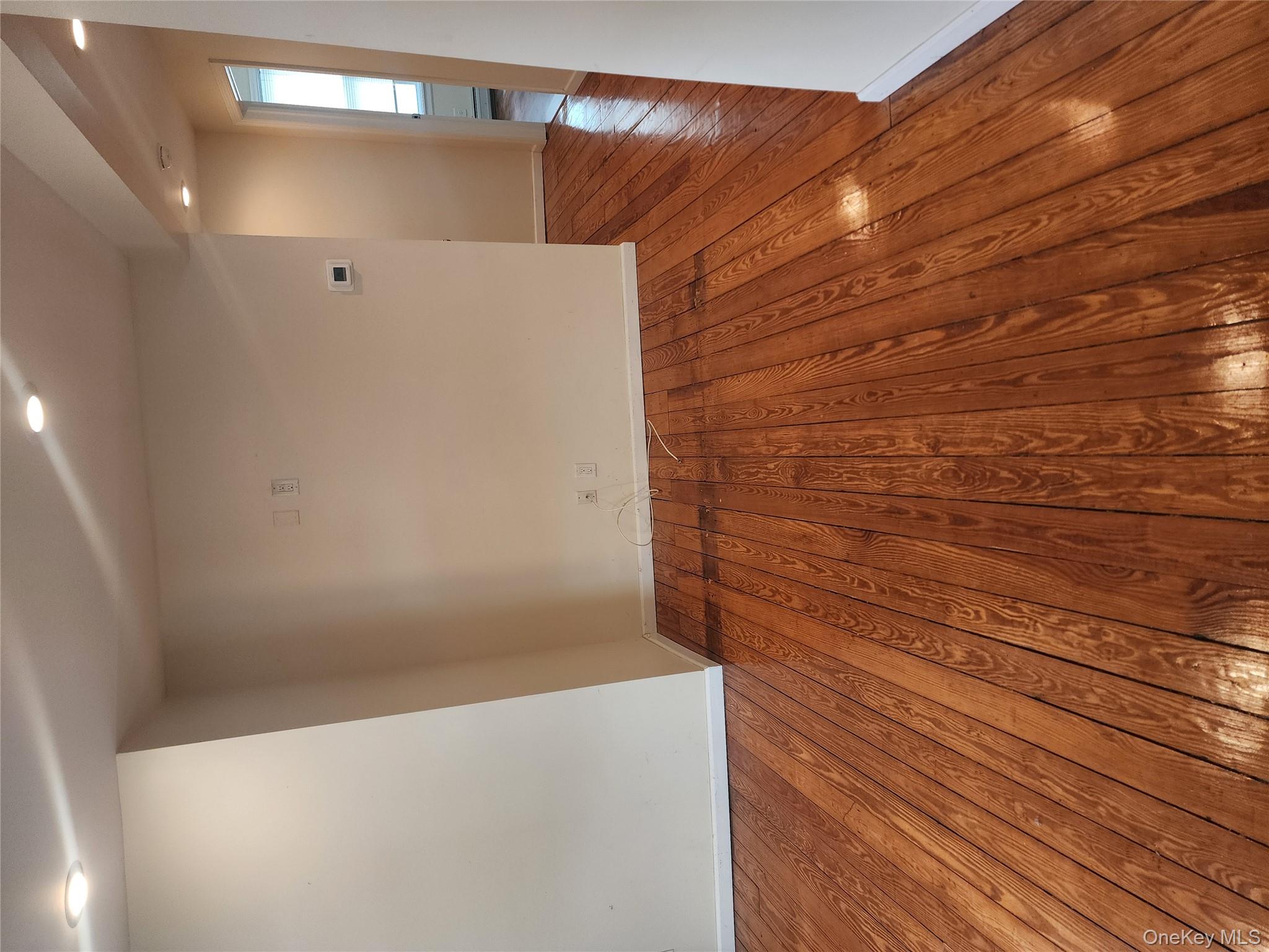 632 Piermont Avenue, Unit 2 Piermont, NY 10968 - Photo 3 of 31 a view of a room with wooden floor and staircase