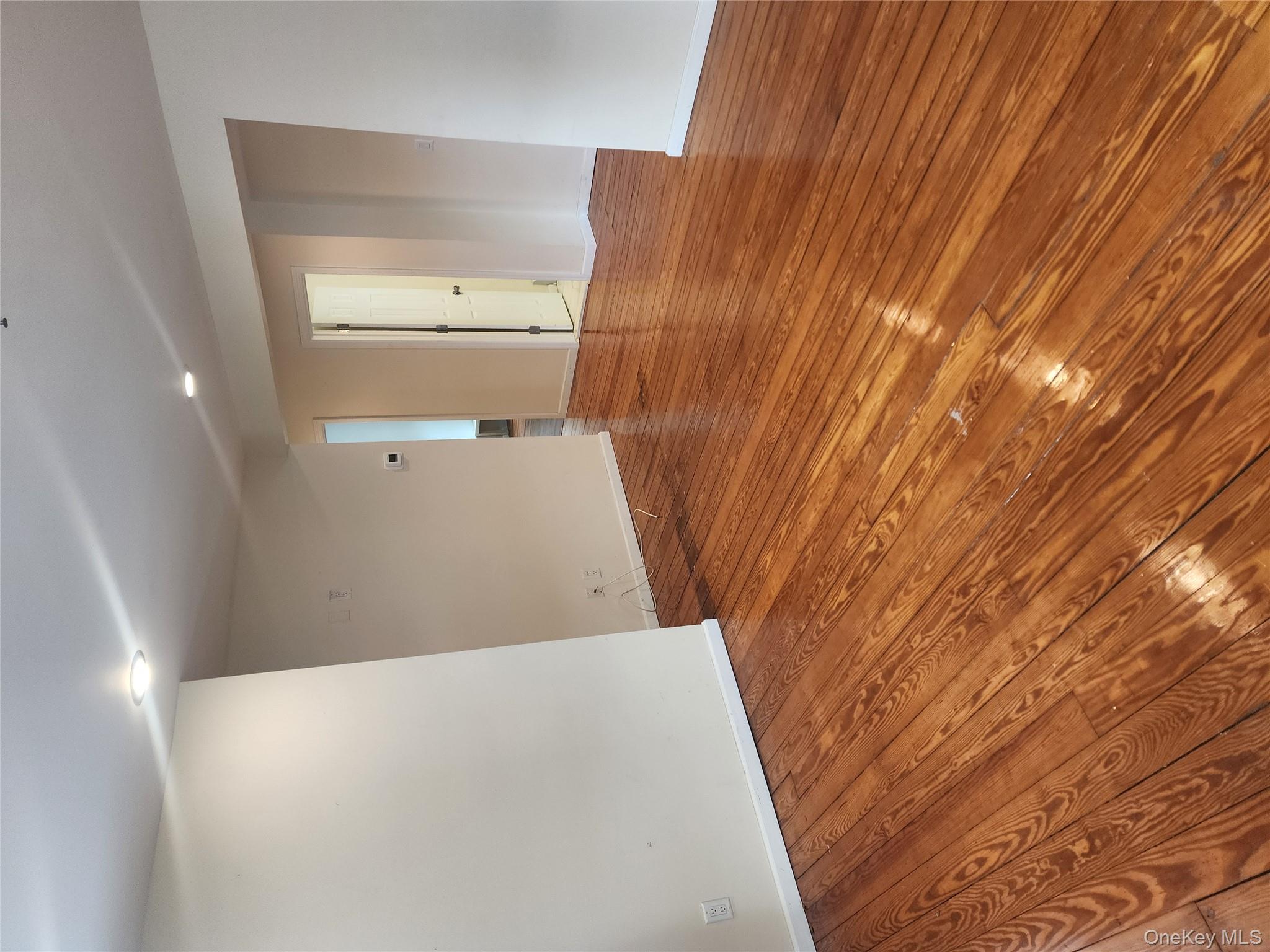 632 Piermont Avenue, Unit 2 Piermont, NY 10968 - Photo 7 of 31 a view of empty room with wooden floor