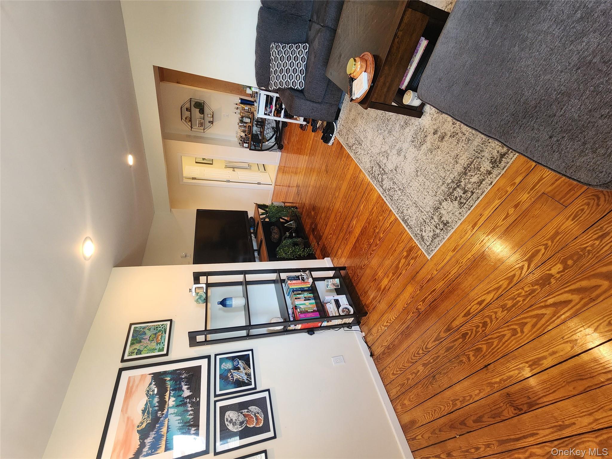 632 Piermont Avenue, Unit 2 Piermont, NY 10968 - Photo 8 of 31 a living room with furniture and a flat screen tv