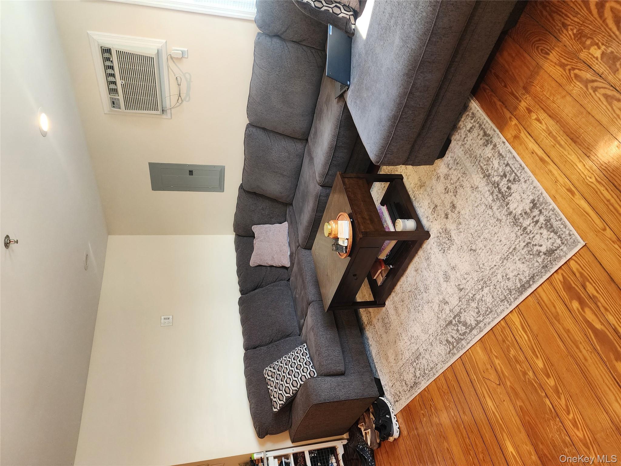 632 Piermont Avenue, Unit 2 Piermont, NY 10968 - Photo 9 of 31 a living room with a couches and painting on the wall