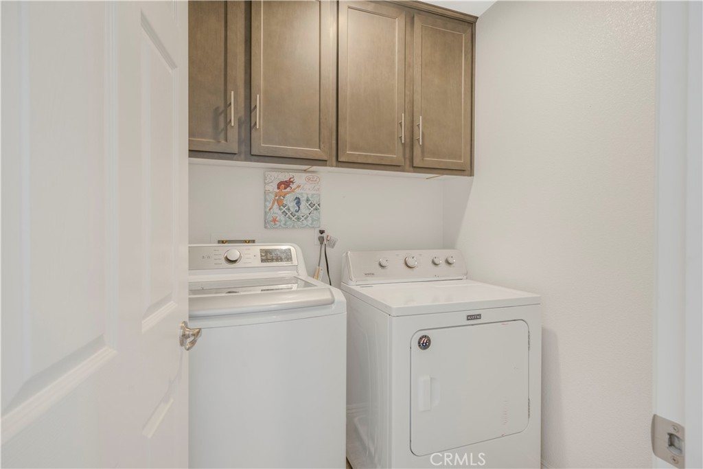 4368 Ladera Drive Guadalupe, CA 93434 - Photo 14 of 39 a utility room with dryer and washer
