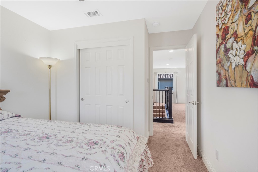 4368 Ladera Drive Guadalupe, CA 93434 - Photo 25 of 39 a bedroom with a bed and cabinets