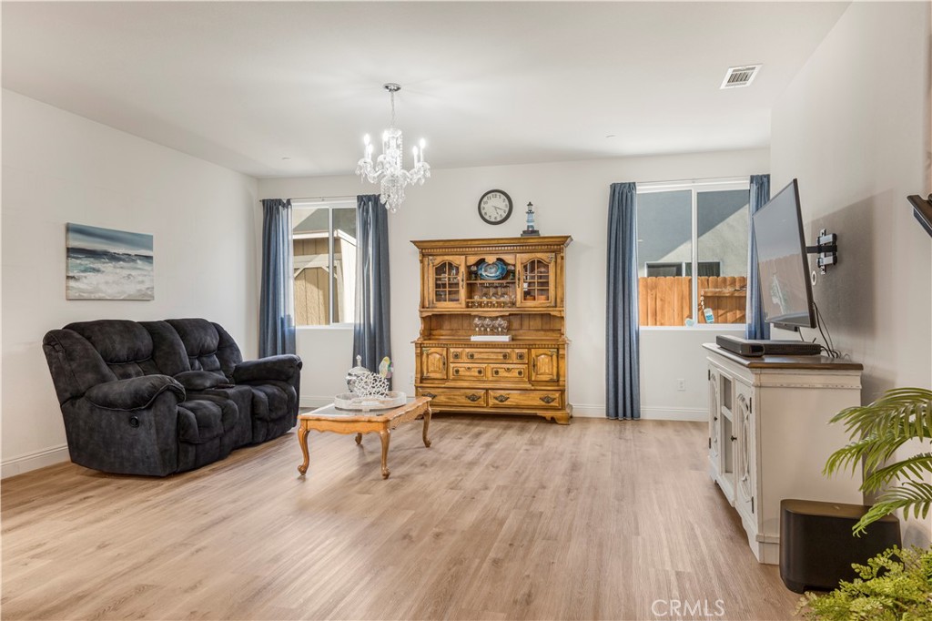 4368 Ladera Drive Guadalupe, CA 93434 - Photo 10 of 39 a living room with furniture and wooden floor
