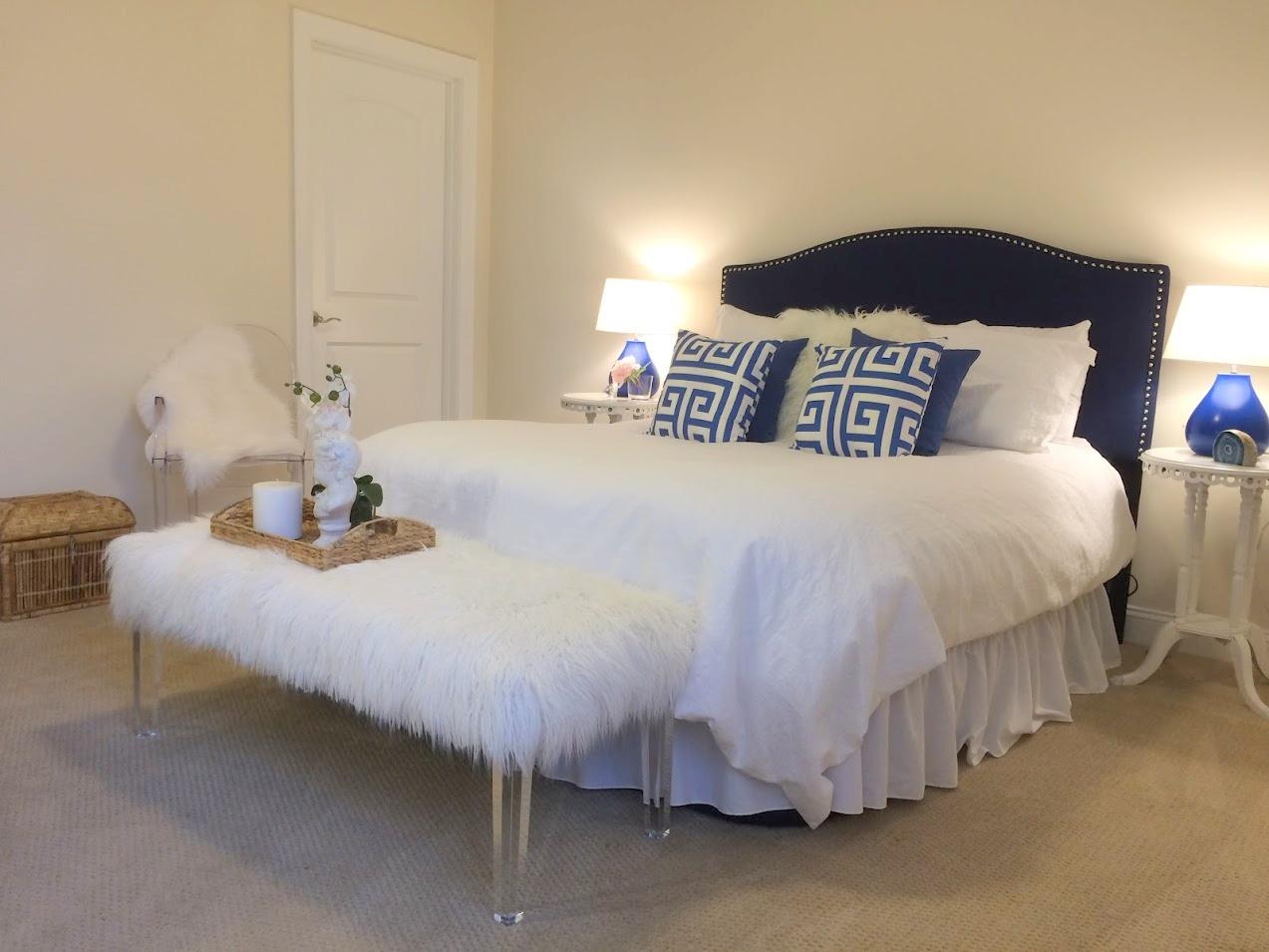 89 Lewis Bay Road, Unit 201 Hyannis, MA 02601 - Photo 7 of 17 a bedroom with a bed and a table