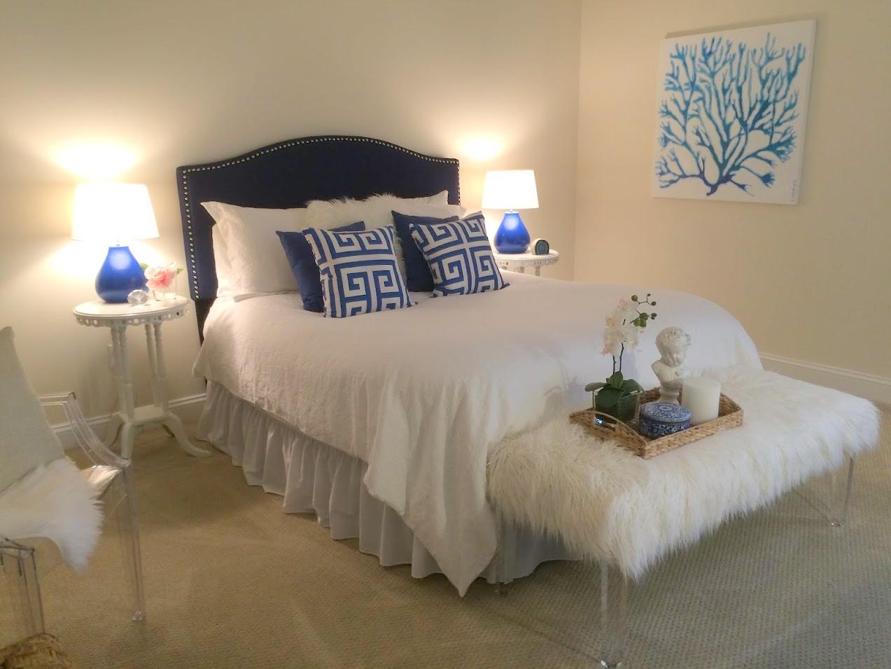 89 Lewis Bay Road, Unit 201 Hyannis, MA 02601 - Photo 8 of 17 a bedroom with a bed and a painting on the wall