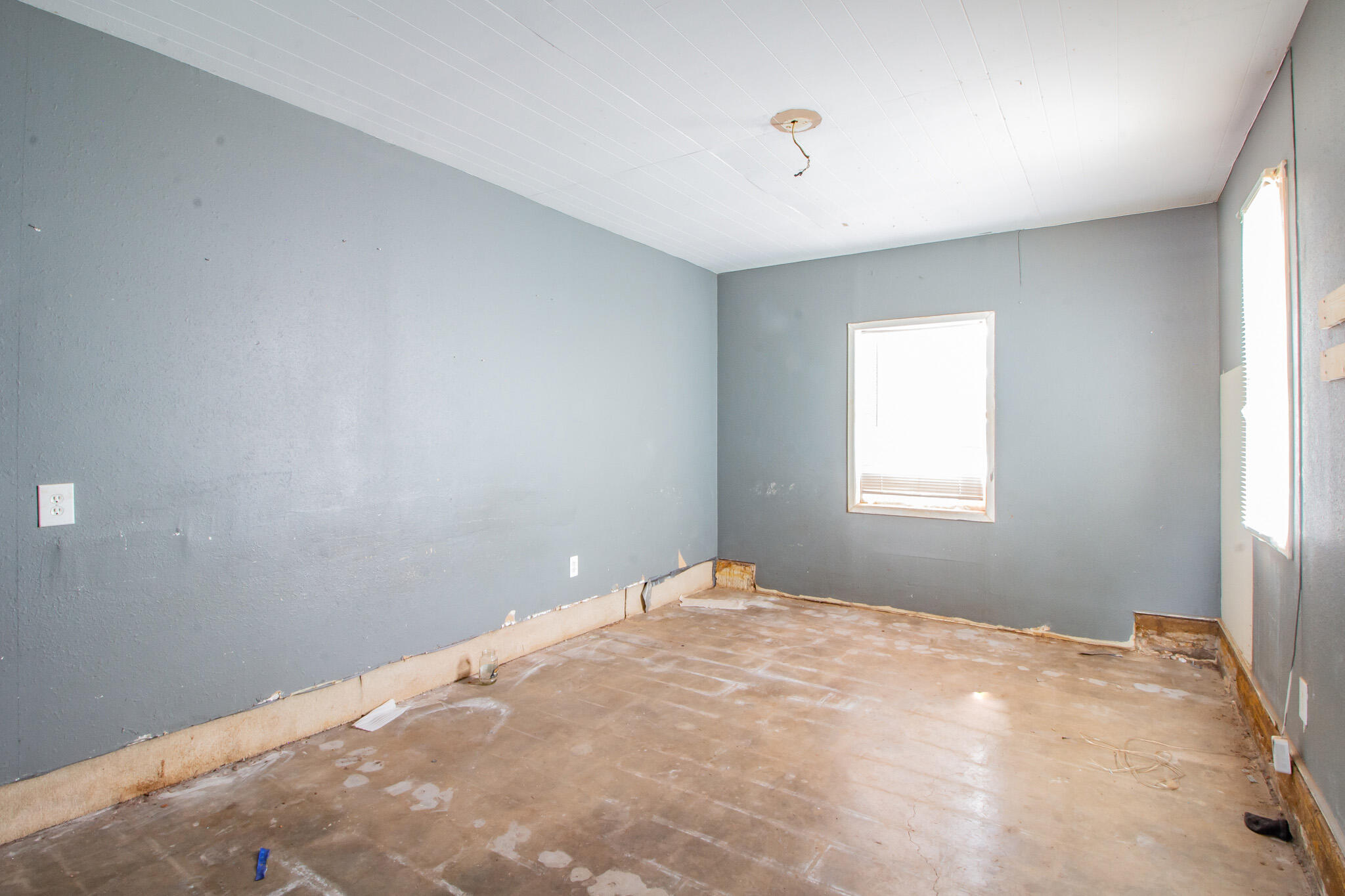 1606 60th Street Lubbock, TX 79412 - Photo 8 of 12 a view of a bedroom with window