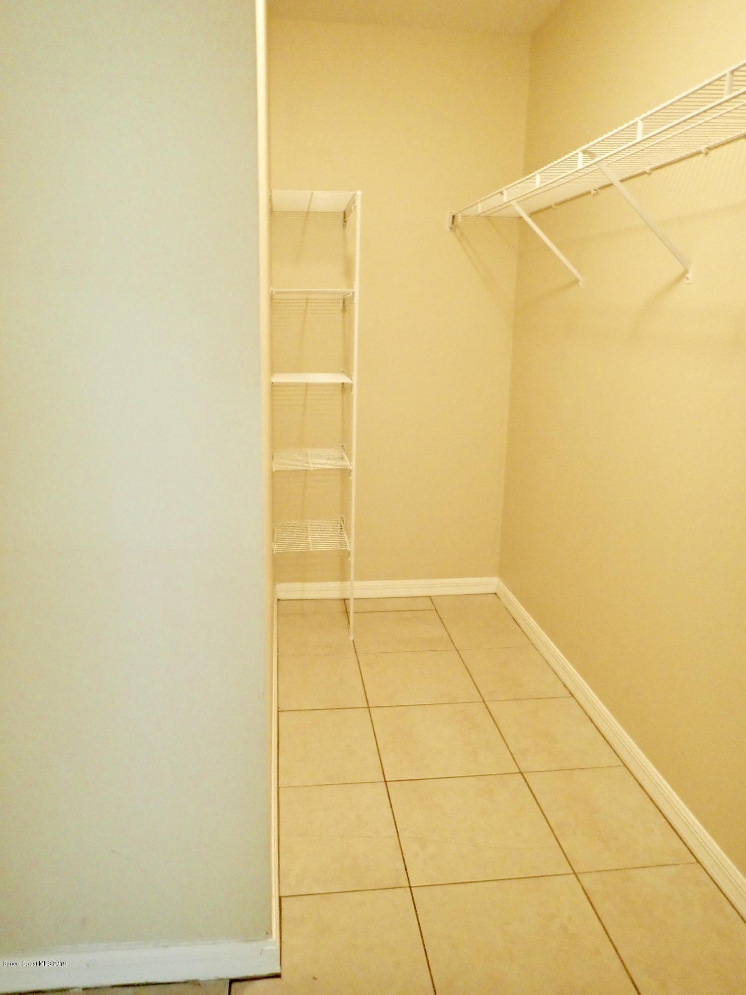 145 Lucas Road Merritt Island, FL 32953 - Photo 12 of 23 Master Walk-in Closet