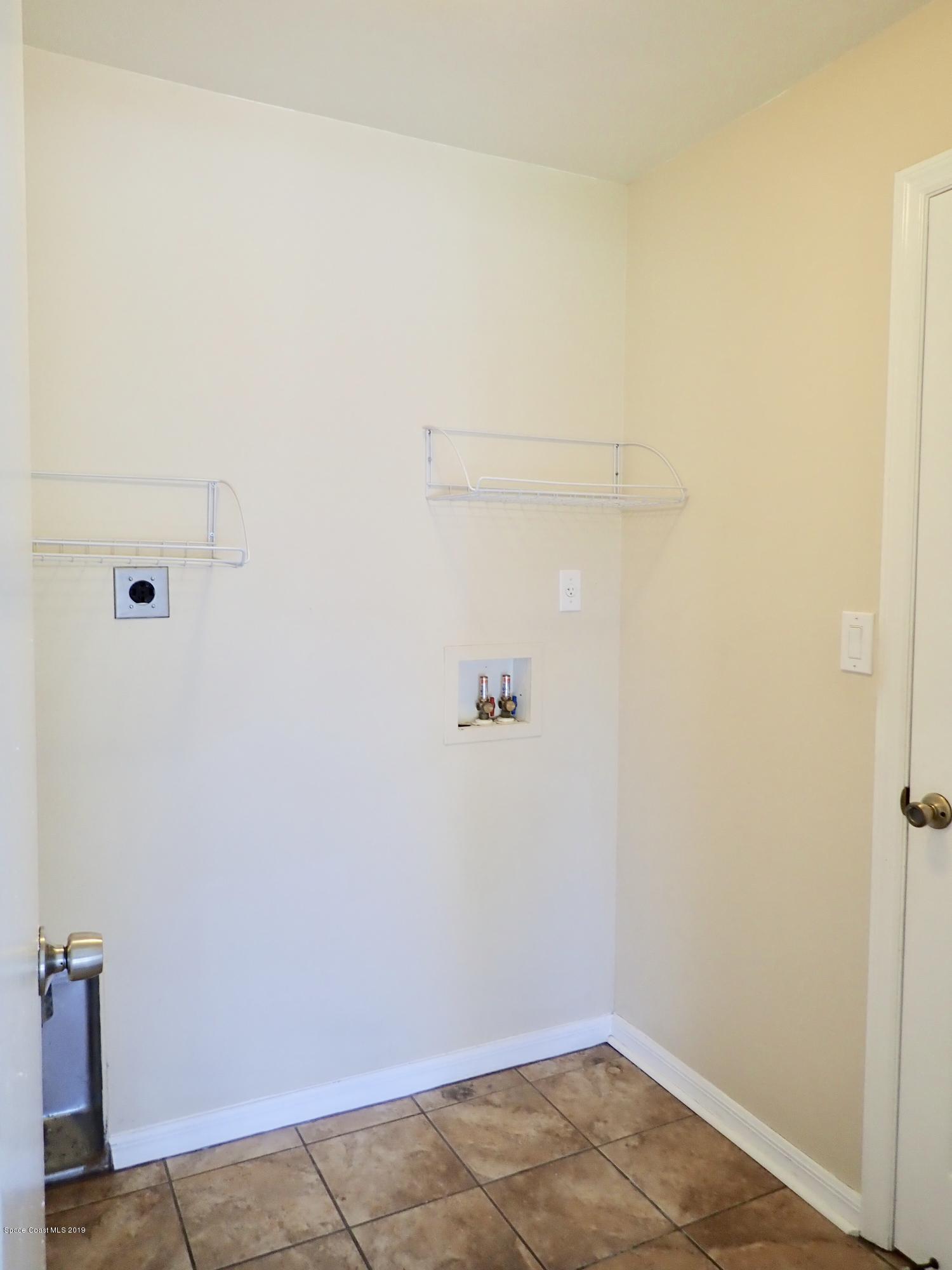 145 Lucas Road Merritt Island, FL 32953 - Photo 17 of 23 Inside Laundry Room