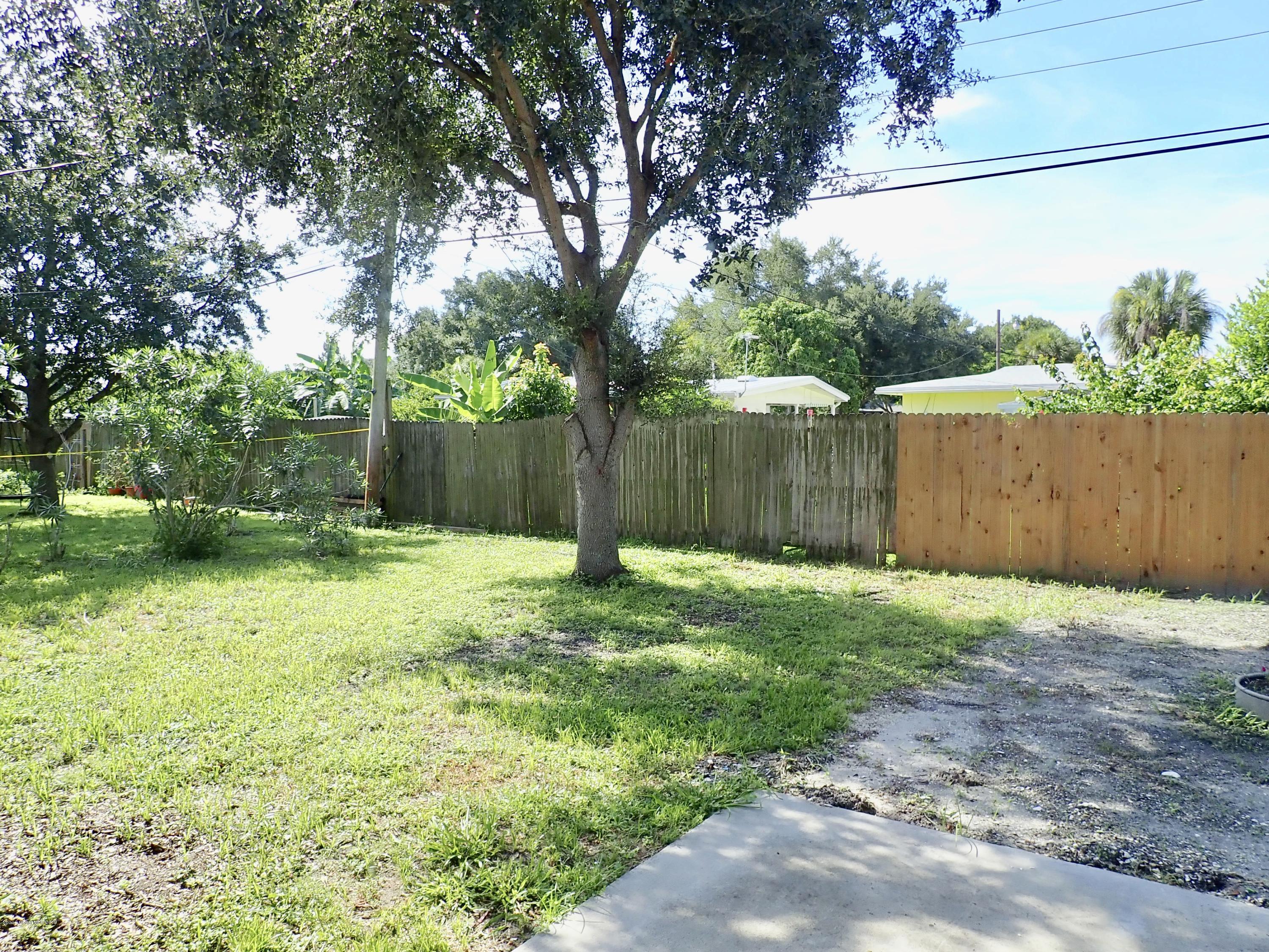 145 Lucas Road Merritt Island, FL 32953 - Photo 19 of 23 Backyard, fenced across back