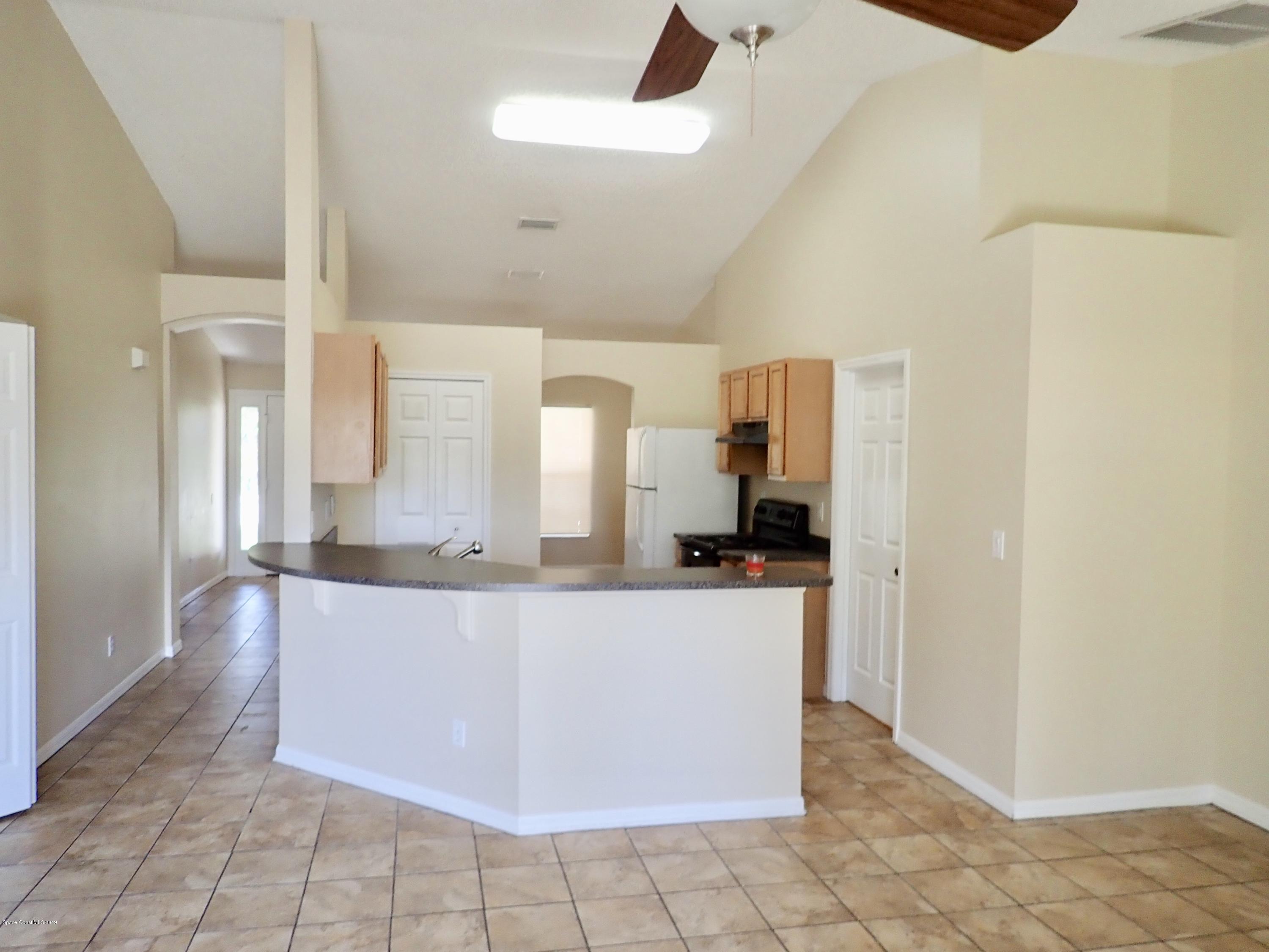 145 Lucas Road Merritt Island, FL 32953 - Photo 5 of 23 Cathedral ceilings, tiled