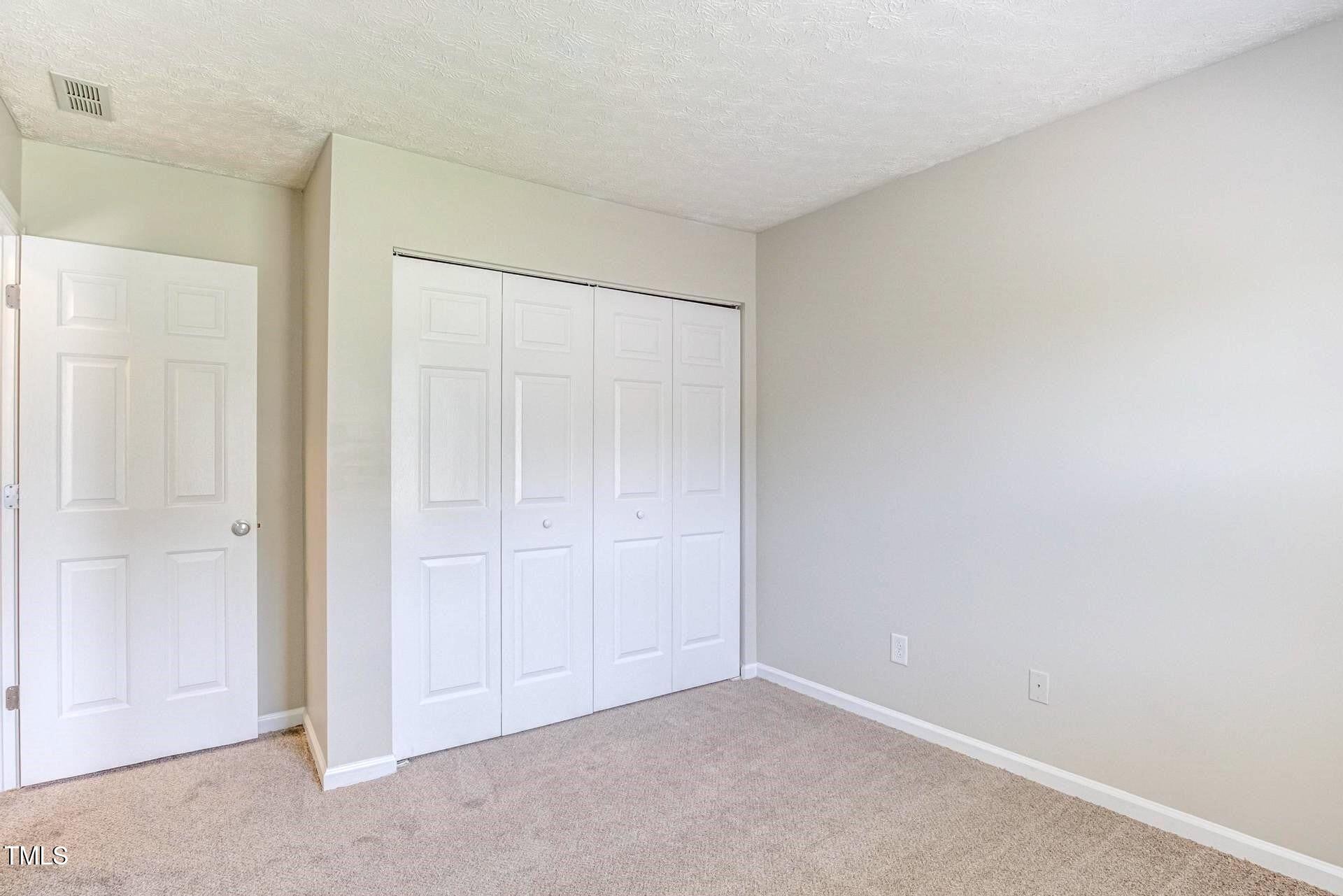 4 Intrepid Court Durham, NC 27703 - Photo 16 of 25 a view of an empty room