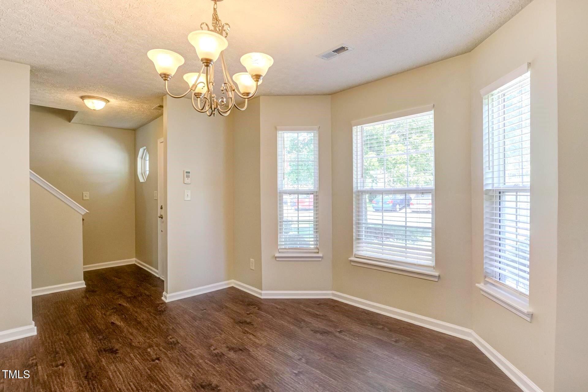 4 Intrepid Court Durham, NC 27703 - Photo 3 of 25 a view of livingroom with window
