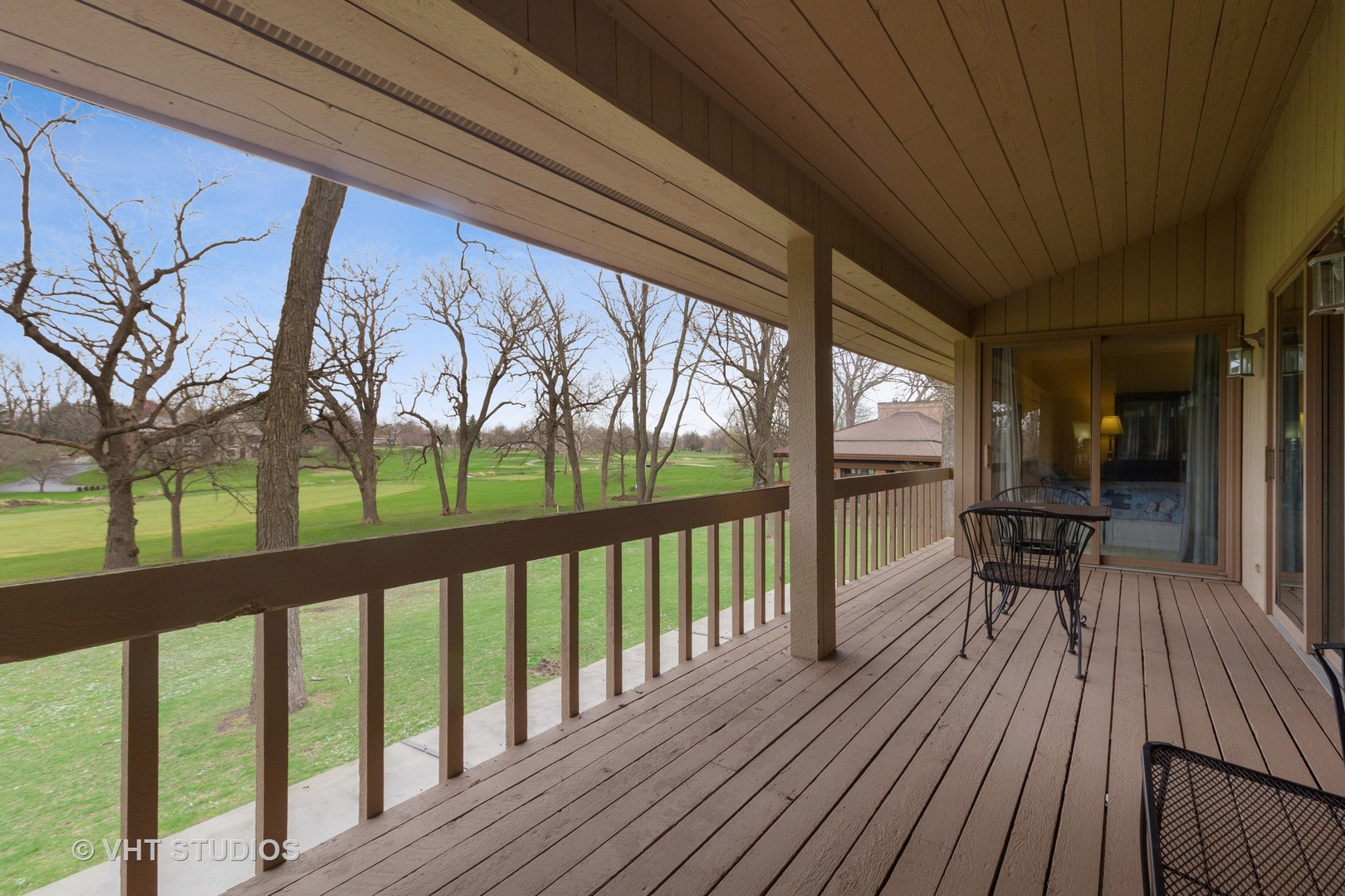 517 Aberdeen Road Frankfort, IL 60423 - Photo 17 of 30 a view of balcony with chairs and wooden floor