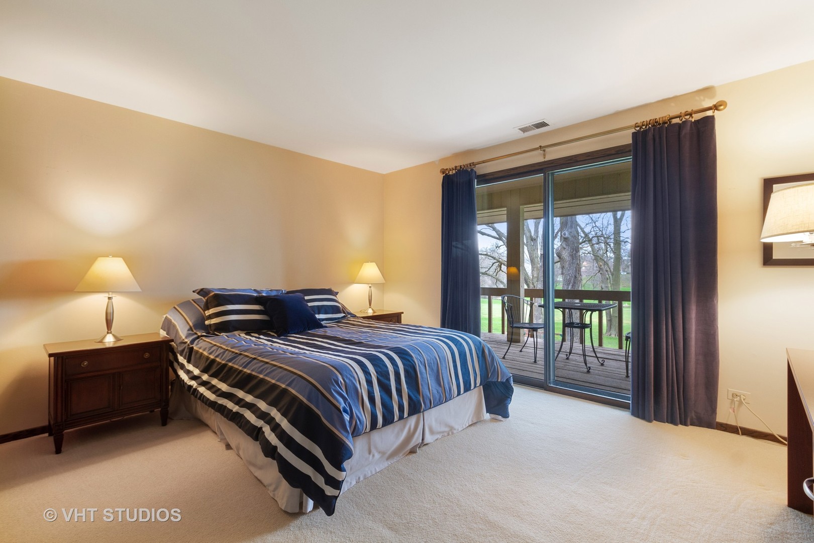 517 Aberdeen Road Frankfort, IL 60423 - Photo 19 of 30 a bedroom with a balcony a bed and a lamp